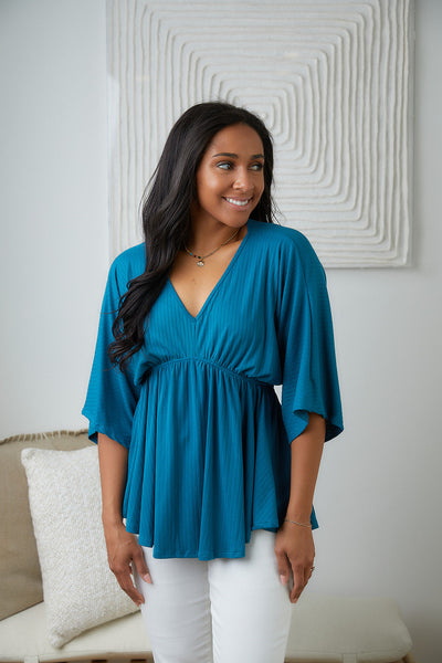 Brand Collab Storied Moments Draped Peplum Top in Teal