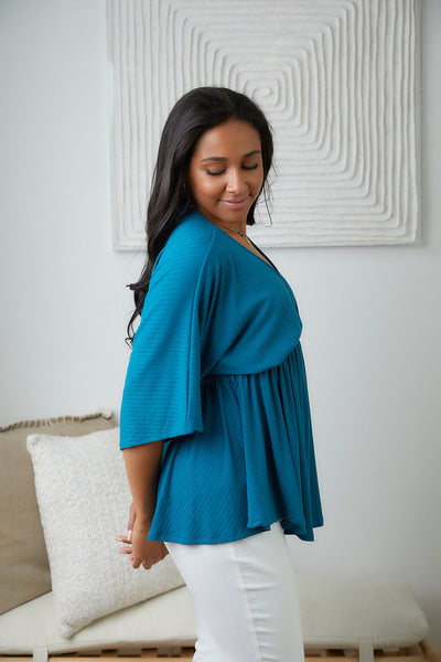 Brand Collab Storied Moments Draped Peplum Top in Teal