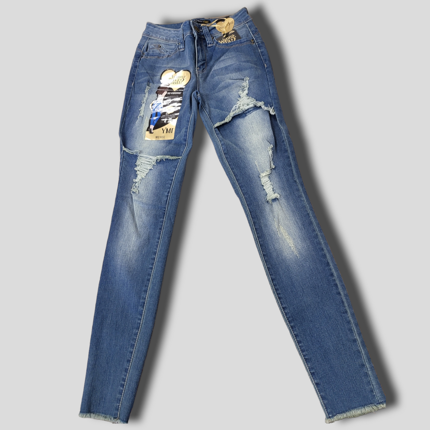 Medium Wash Mid Rise Distressed Skinny Jeans